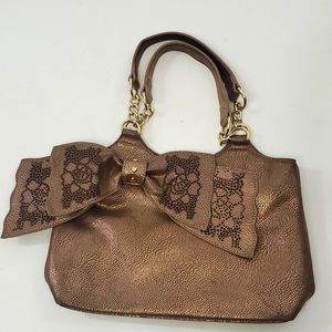 Cute purse with big bow copper color